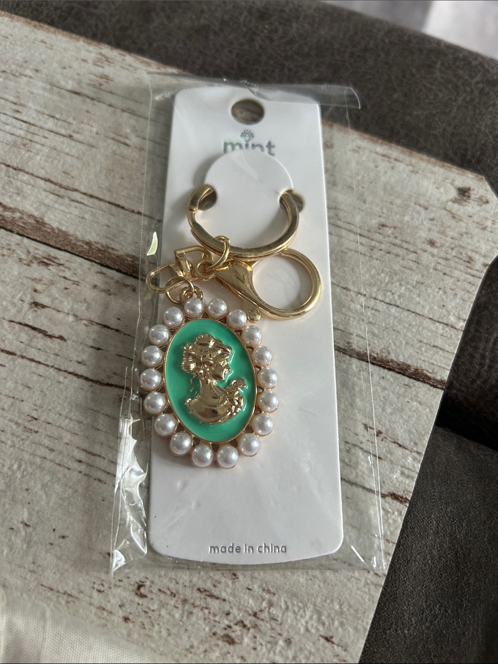 5/$25 Mint Gold-Tone Cameo Keychain with Green Enamel and Pearl Trim